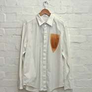 روش های  پاک کردن لکه ی اتو از روی لباس